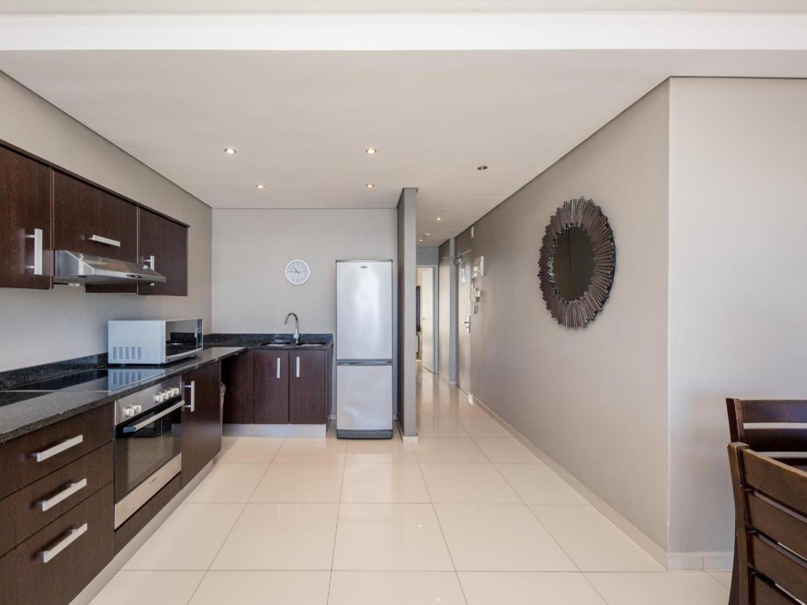 Infinity Self Catering Apartments Блаубергстранд Номер фото